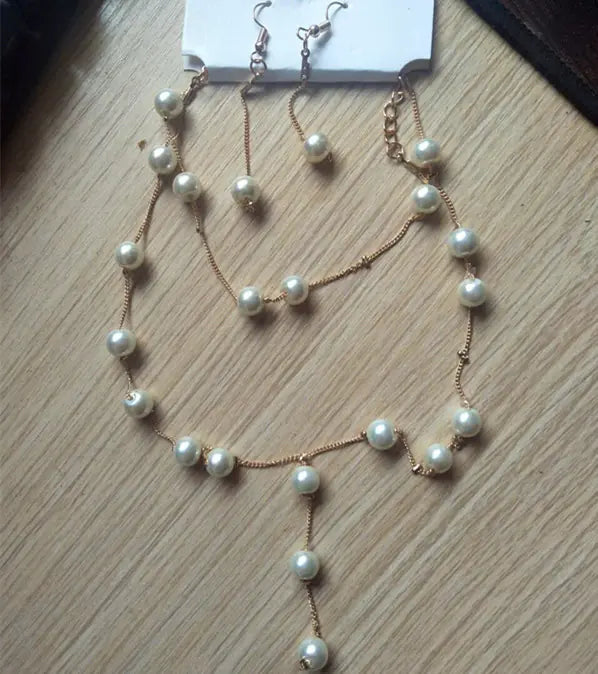 Elegant Pearl Jewelry Set: Necklace, Earrings, Bracelet