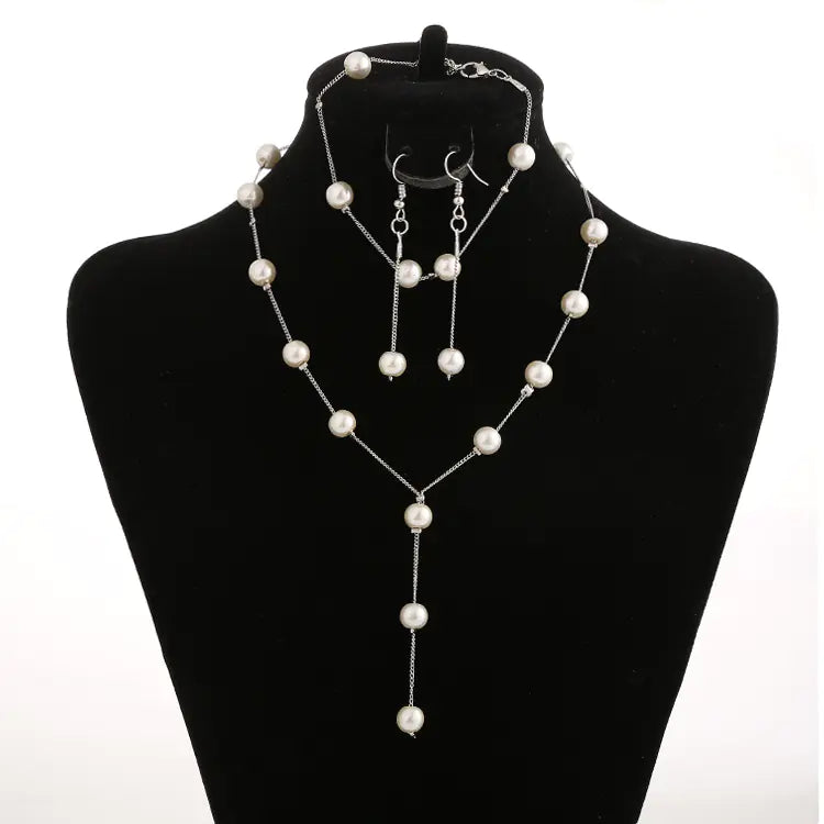 Elegant Pearl Jewelry Set: Necklace, Earrings, Bracelet