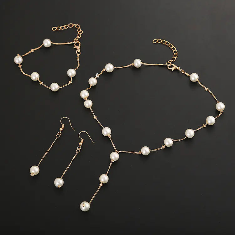 Elegant Pearl Jewelry Set: Necklace, Earrings, Bracelet