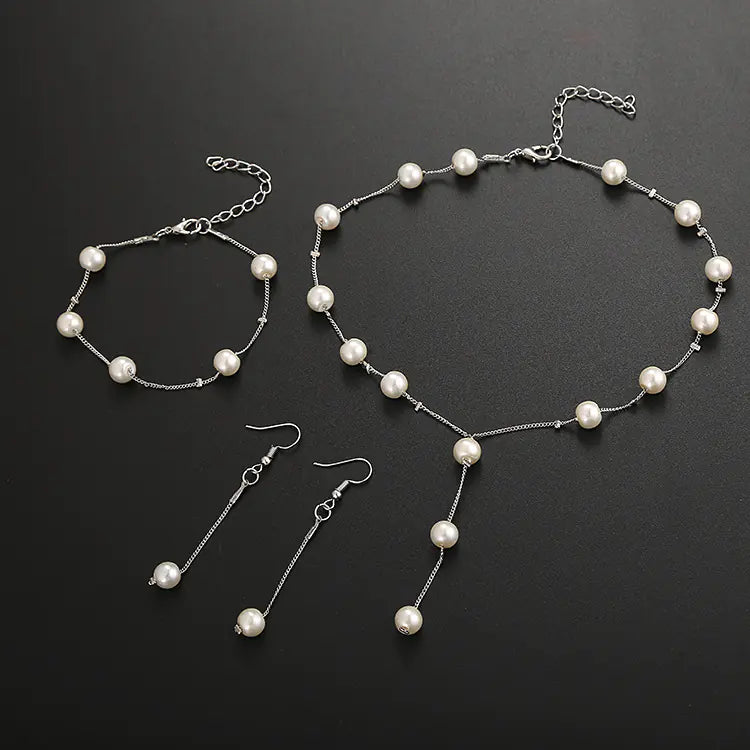 Elegant Pearl Jewelry Set: Necklace, Earrings, Bracelet