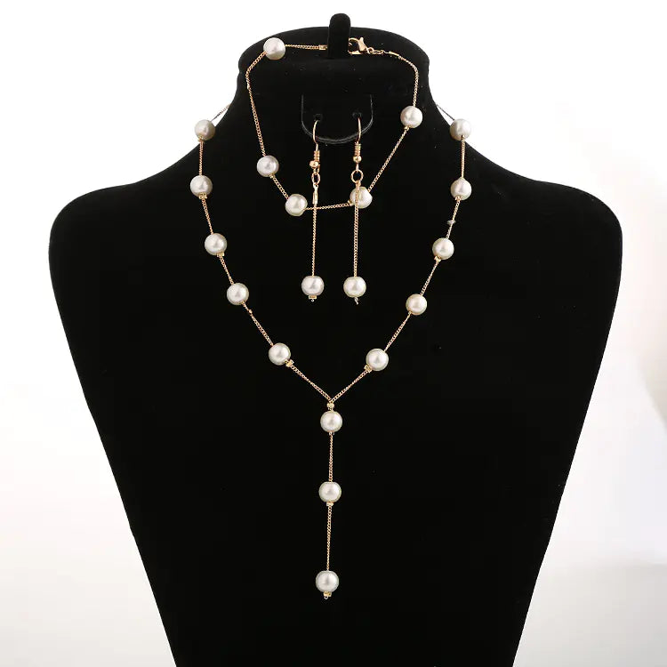 Elegant Pearl Jewelry Set: Necklace, Earrings, Bracelet